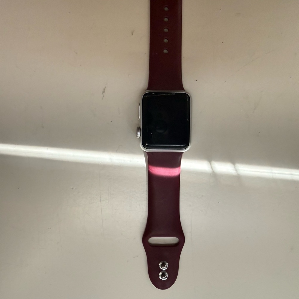 Apple Smartwatch with burgandy Strap
